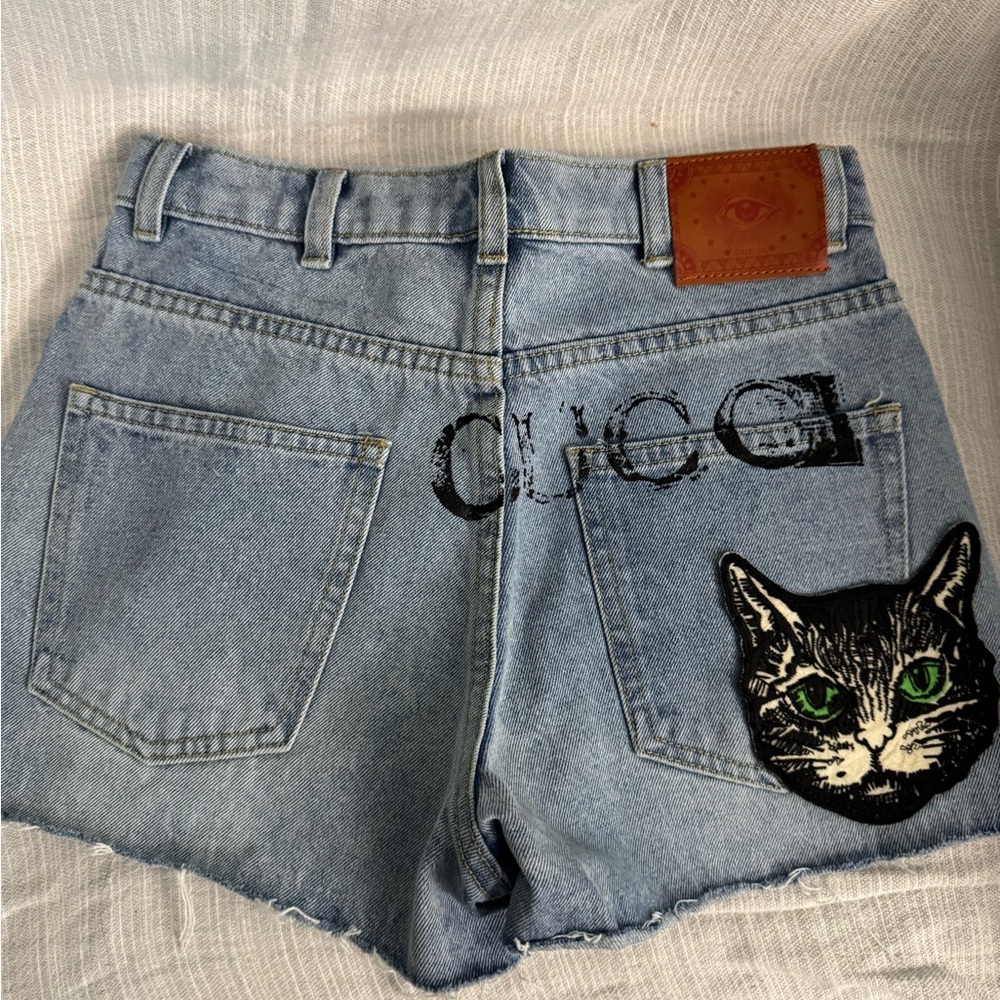 Gucci Blue Denim with Brown Leather Patch